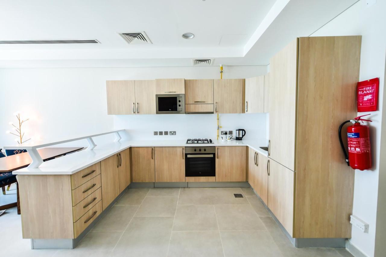 Waterfront Hotel Apartment Lusail エクステリア 写真 A typical kitchen in a student residence hall